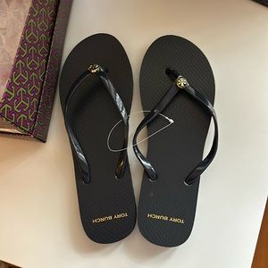 Tory Burch navy flip flops never used